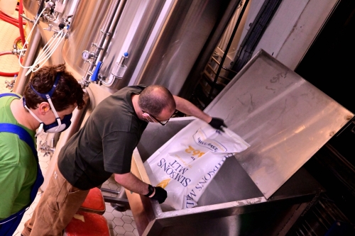 In go the bags of grain.